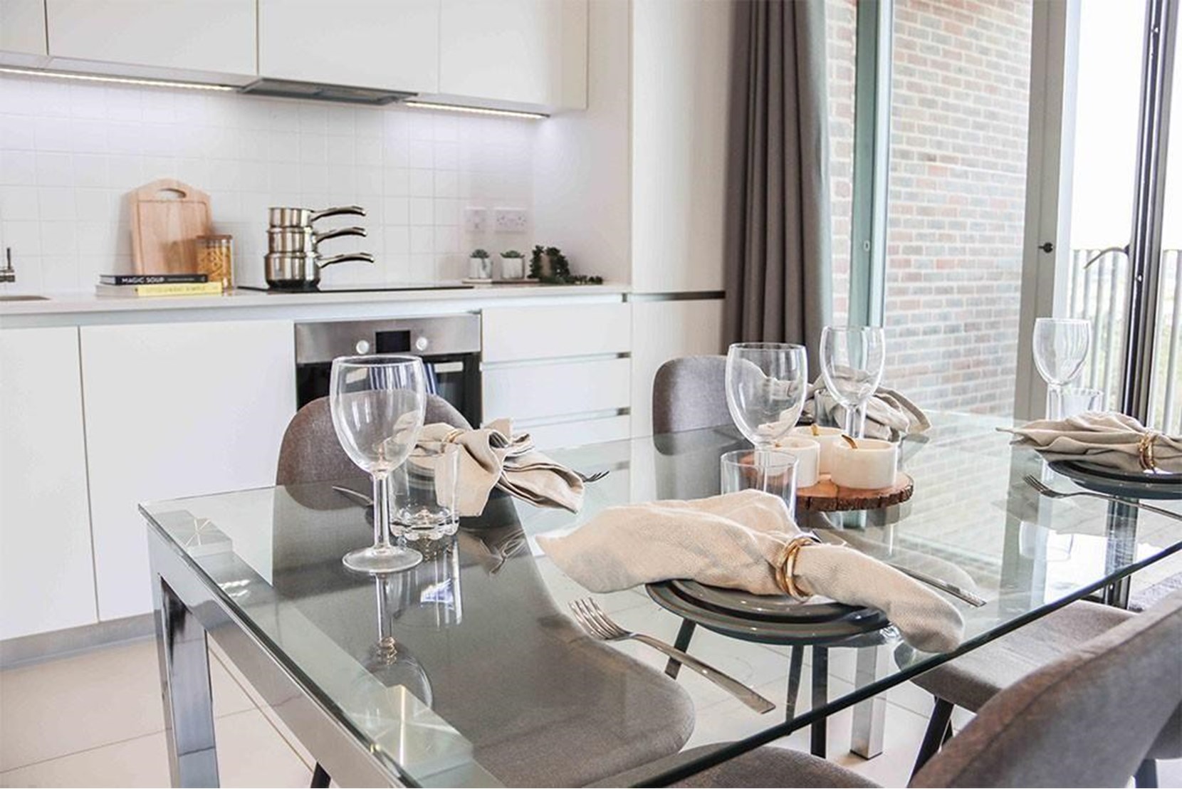 Apartments to Rent by Savills at Rehearsal Rooms, Ealing, W3, kitchen dining area