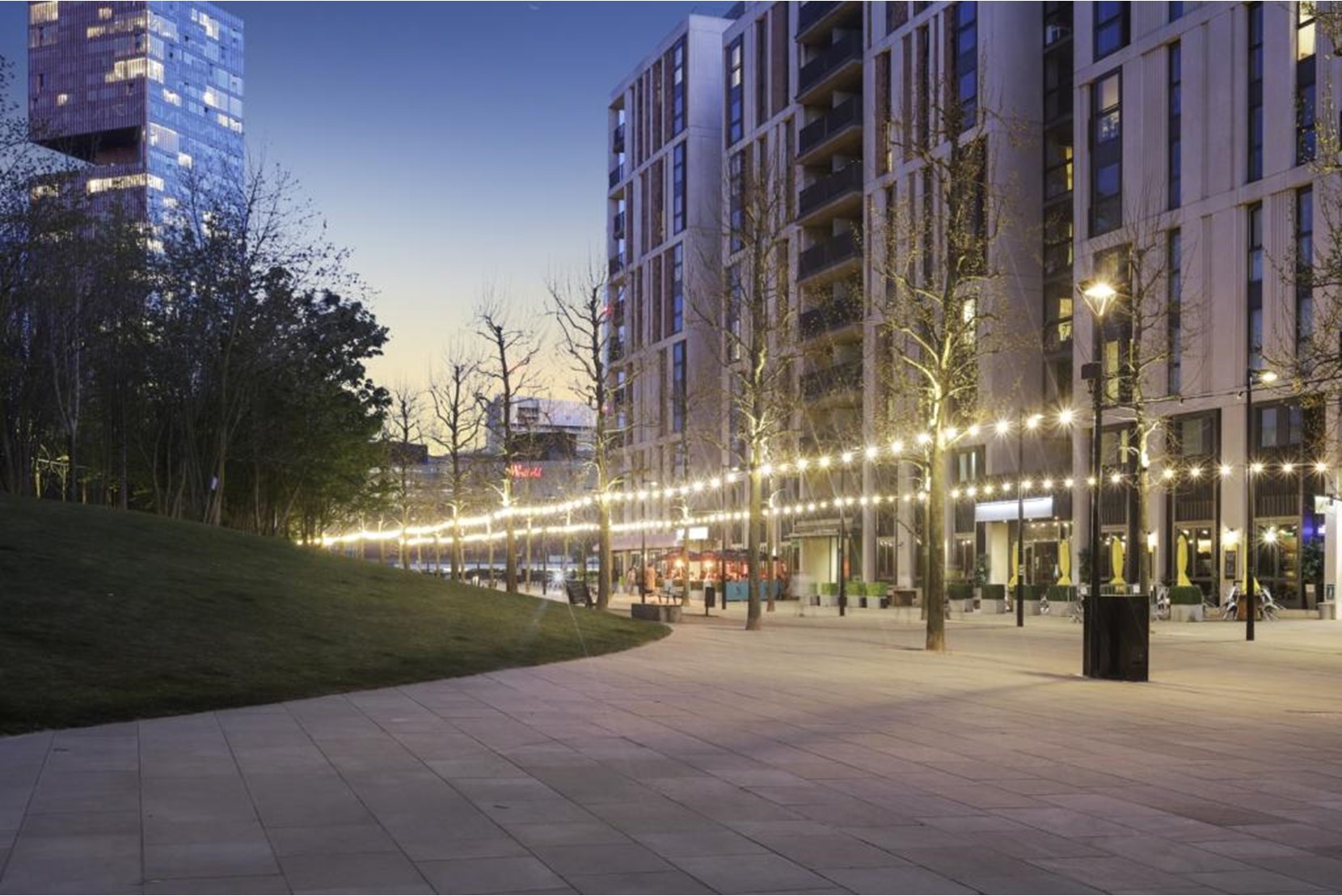 Apartments to Rent by Get Living at East Village, Newham, E20, development panoramic night view
