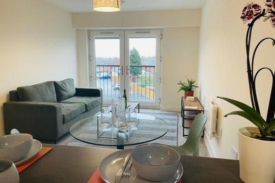 Apartments to Rent by Una Living in Hunslet House, Corby, NN17, living dining area