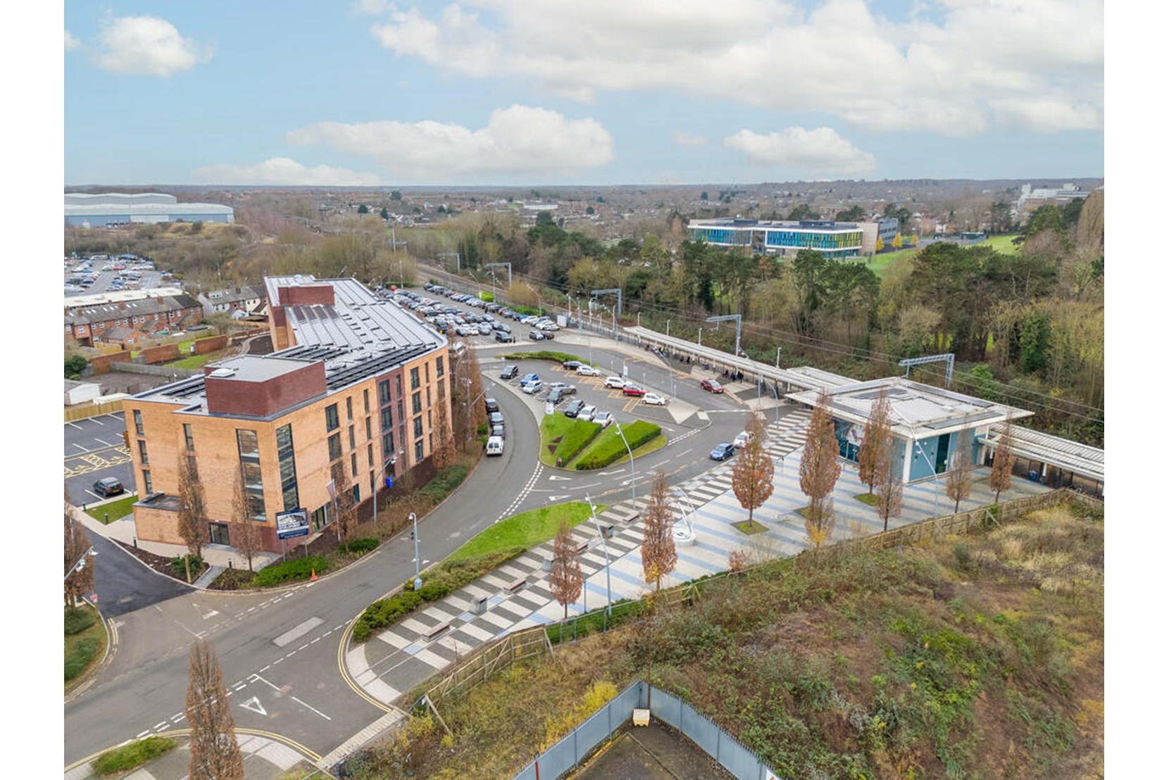 Apartments to Rent by Una Living in Hunslet House, Corby, NN17, aerial building panoramic view